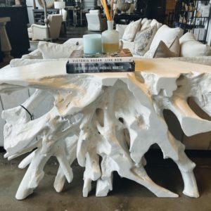 White driftwood table welcomes customers to a holiday sale at a Michigan home store